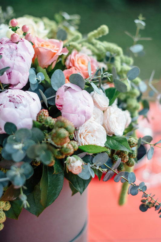 Beautiful peonies in vase for blog about study showing flowers in the home creates happiness